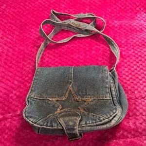 Cute little denim purse with Star. snap closure